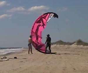 swim brief help launch kite surfer